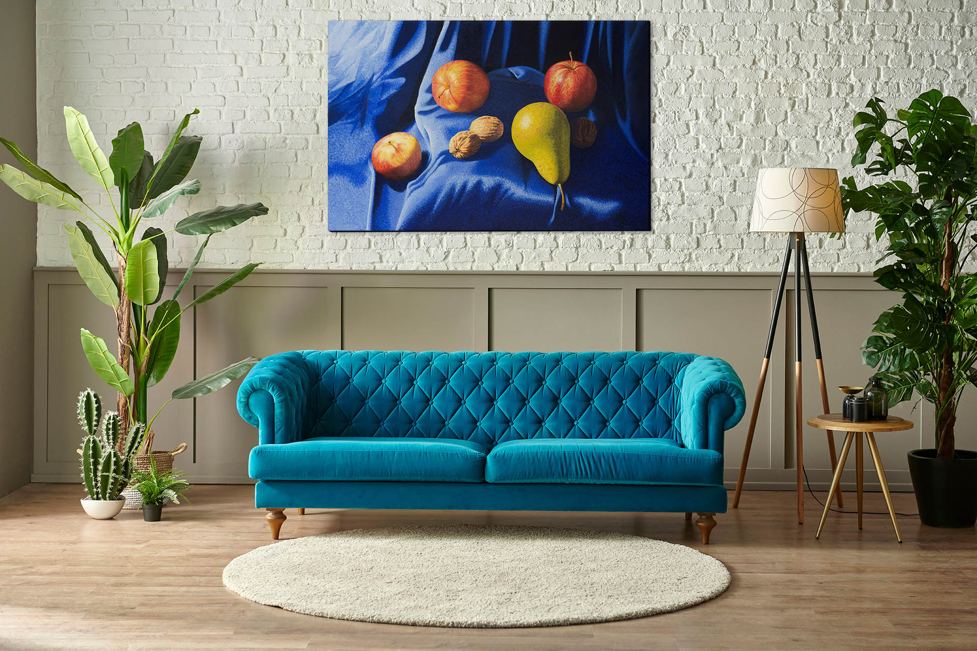 Green leather sofa three person with wall art in background