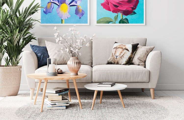 Coffe table with 2 person modern sofa and wall art