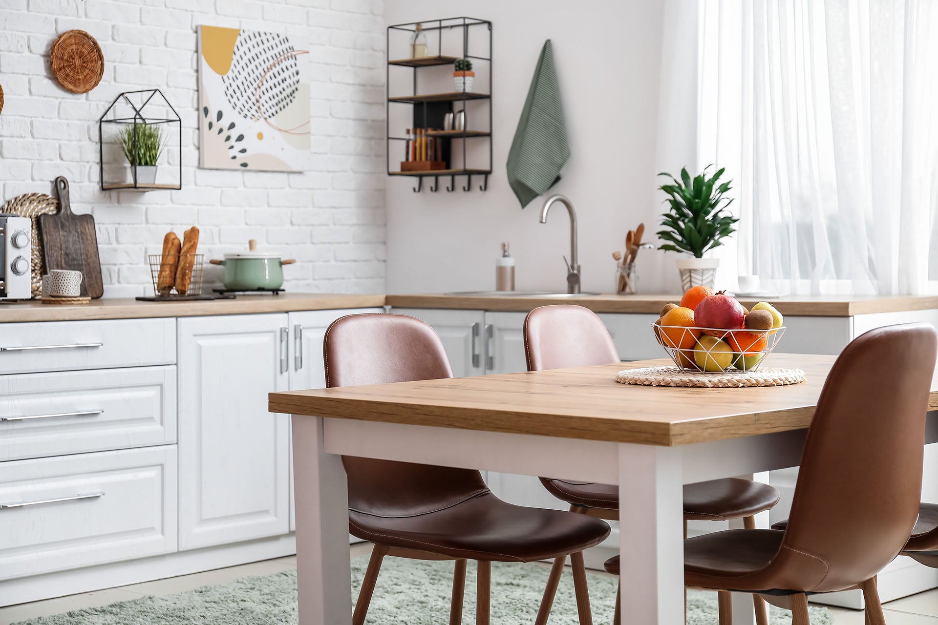 Brown wooden dining chair and table set in modern kitchen
