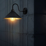 Home Symphony Premium Wall Light Cone 8in Gold Inner Shade Swan Neck E27 mounted on a concrete wall.