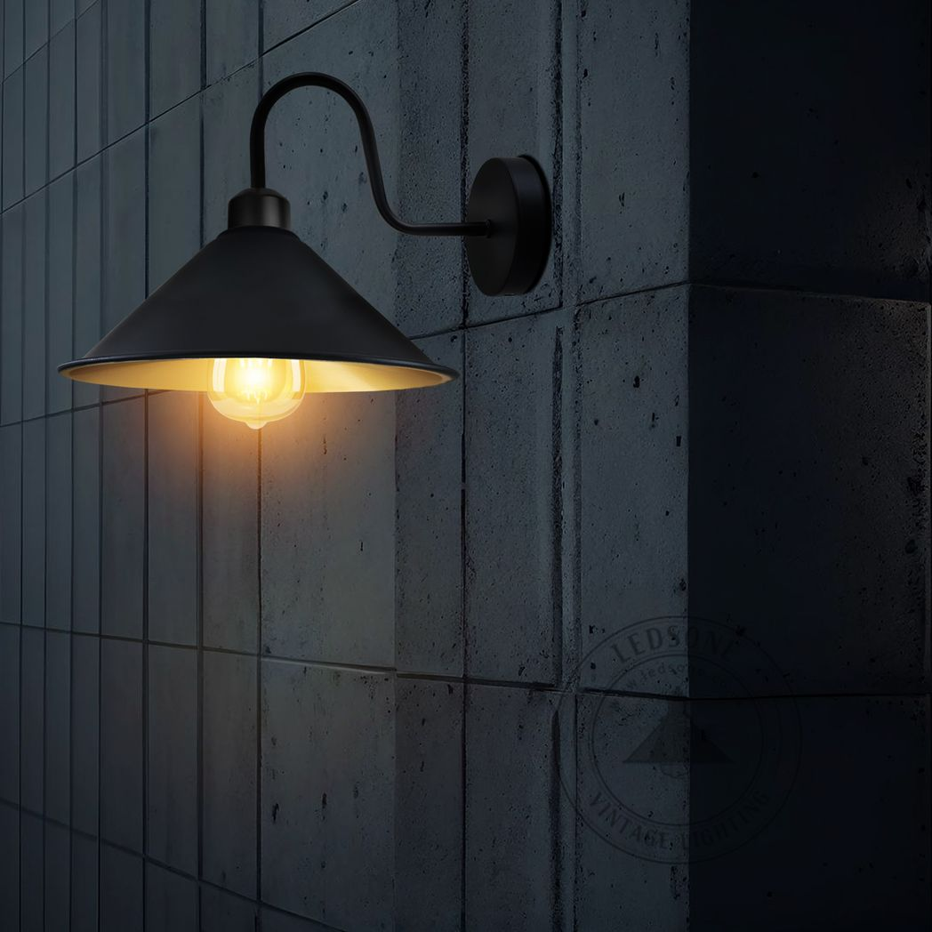Home Symphony Premium Wall Light Cone 8in Gold Inner Shade Swan Neck E27 mounted on a concrete wall.