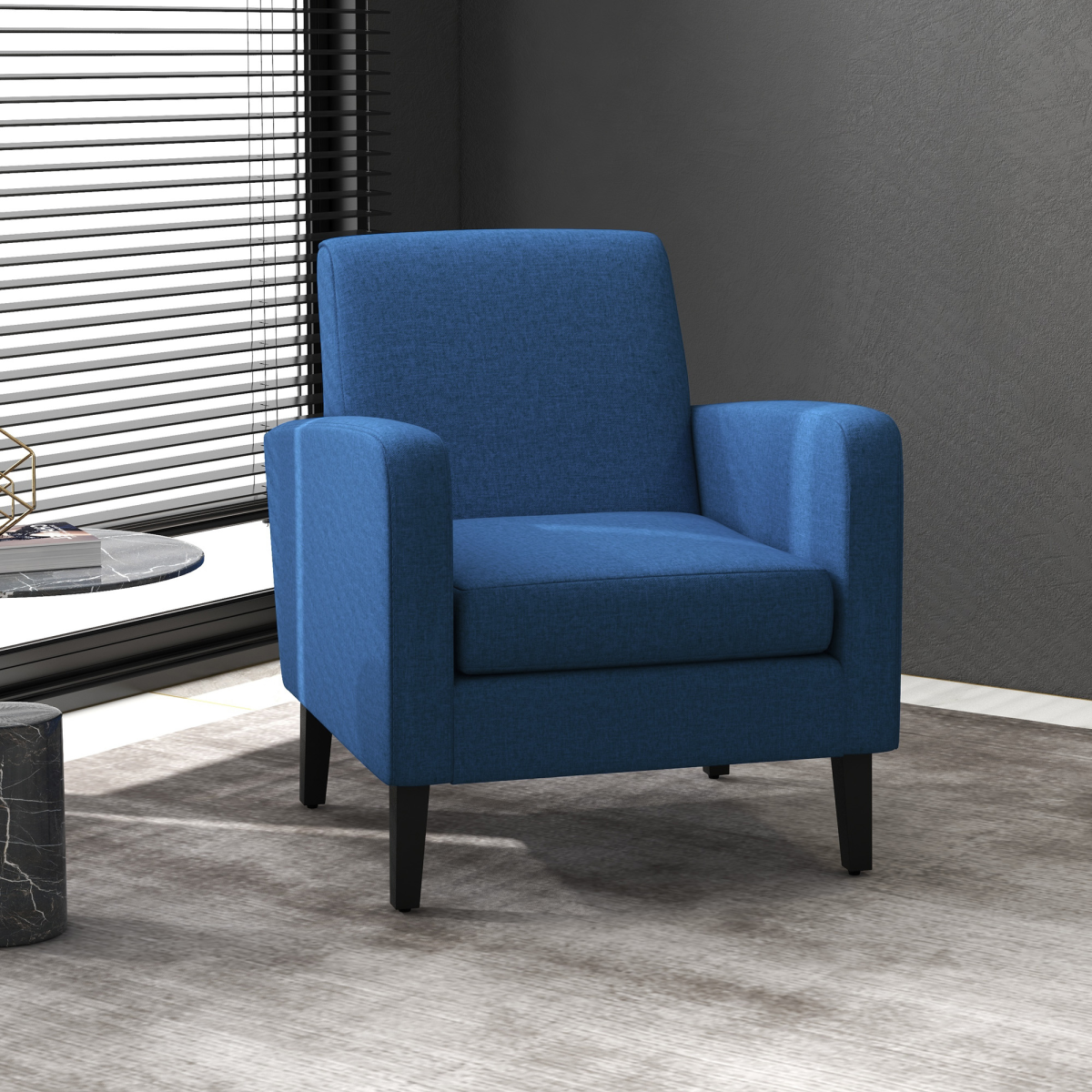 Blue HOMCOM compact armchair with rubber wood legs in a modern bedroom corner.