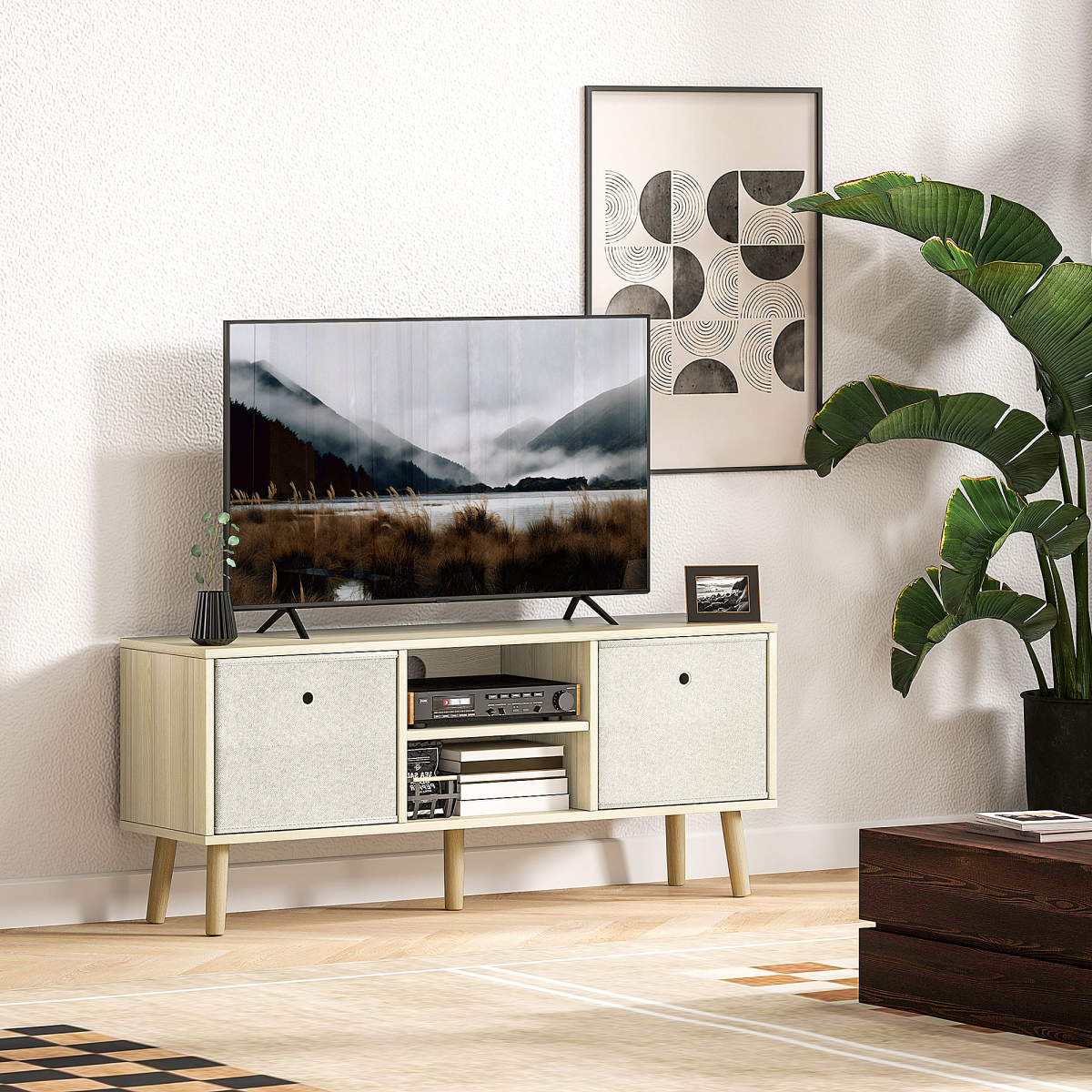HOMCOM Modern TV Cabinet with Shelves Drawers for Bedroom in light wood finish with two fabric drawers and TV on top.