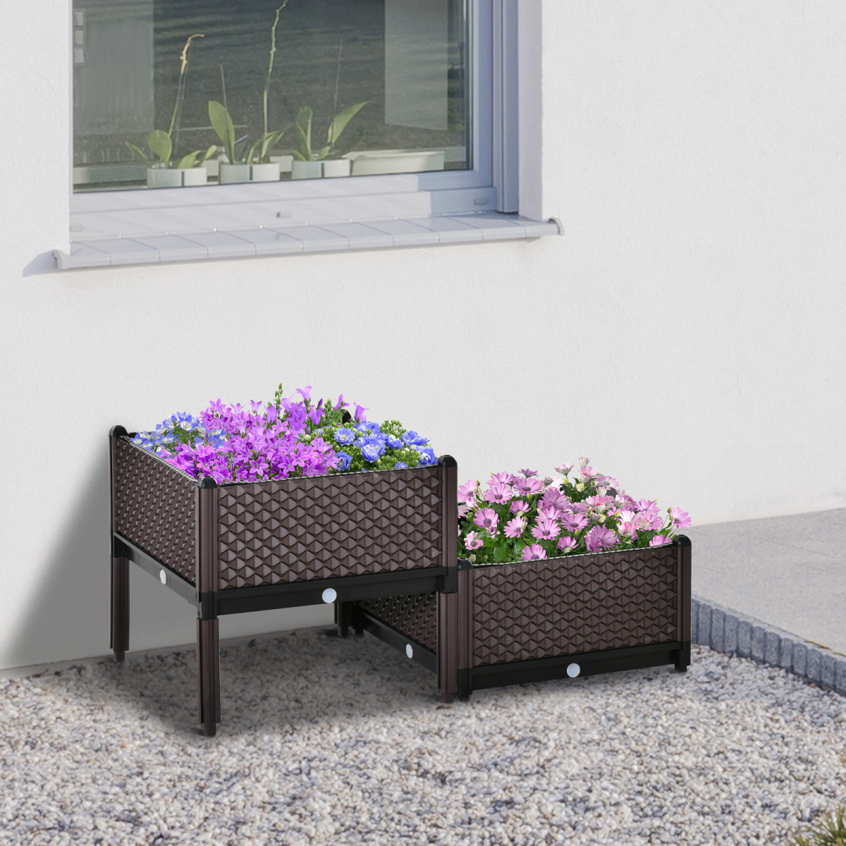 Duo Design two-tier self-watering planter on legs with brown lattice pots and purple, blue, pink flowers