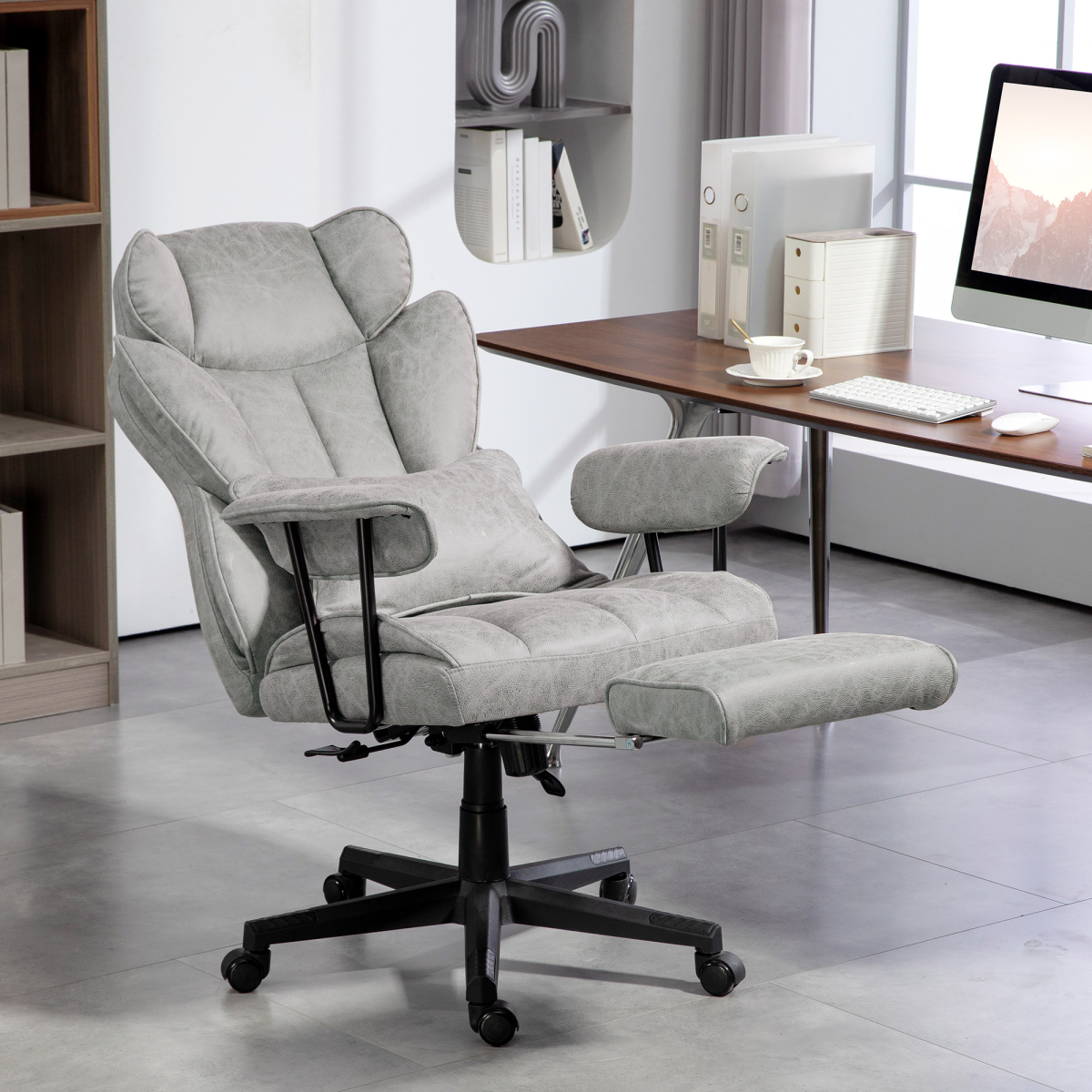 HOMCOM Office Chair 16cm Padding Footrest For Home Office in grey upholstery with footrest by a desk.
