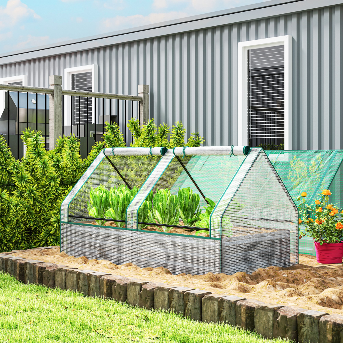 Outsunny Garden Bed Planter Box with 10cm edge greenhouse on a galvanized steel frame, outdoors with leafy greens.