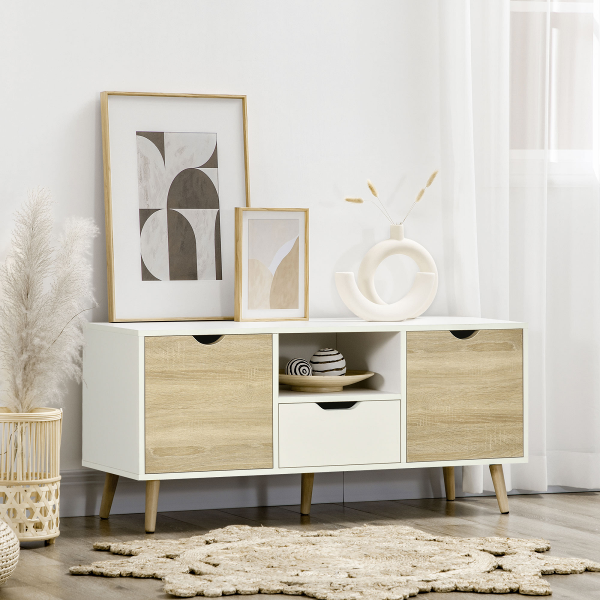 Modern TV unit with white frame, wood-look doors, open shelf and center drawer for living room.