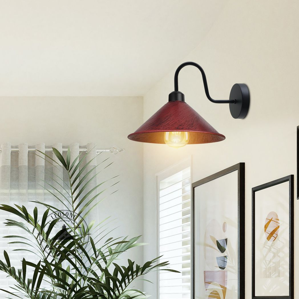 Rustic Red Wall Light Fixture Medium Dimmable Bedroom by Home Symphony emits warm downward glow in a bedroom.