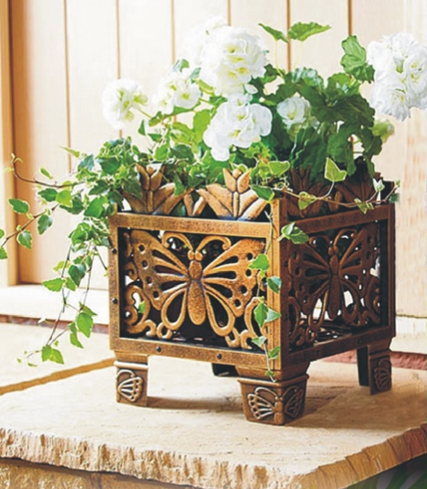 Bronze butterfly planter rack, 12x8x9in, decorative metal garden decor with plant pot inside.