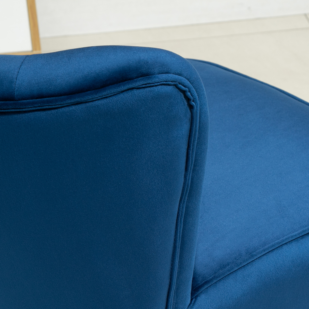 Lux Velvet Accent Chair With Ottoman Compact Velvet Home by Home Symphony in navy velvet, close-up arm detail.