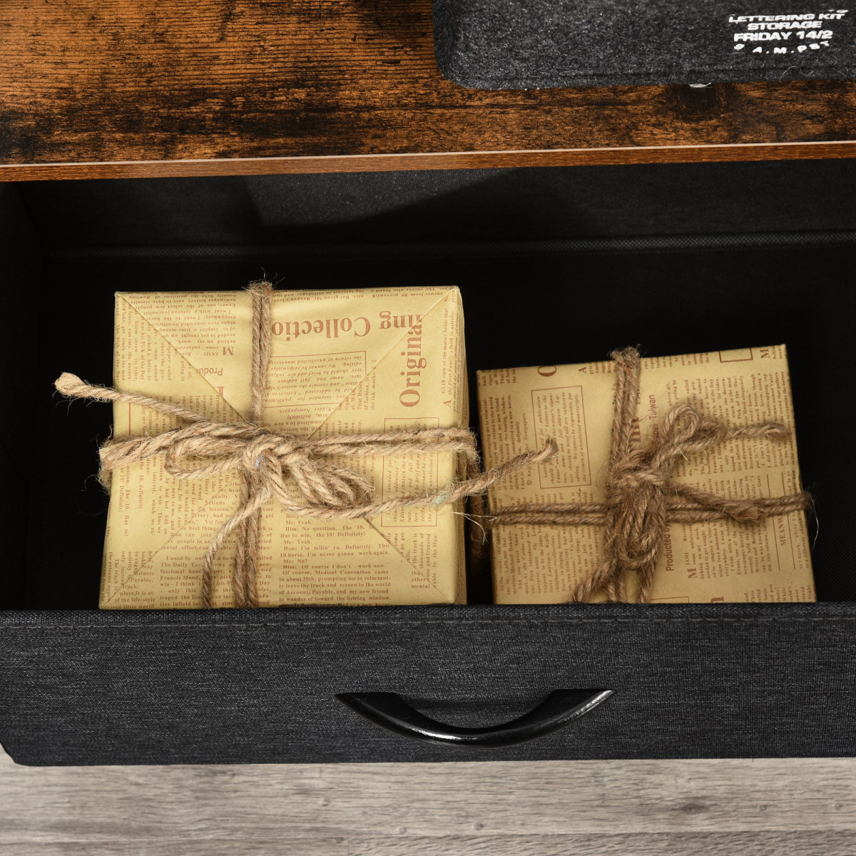 HOMCOM TV Console with wide foldable linen drawers; open drawer shows wrapped gifts in newspaper.
