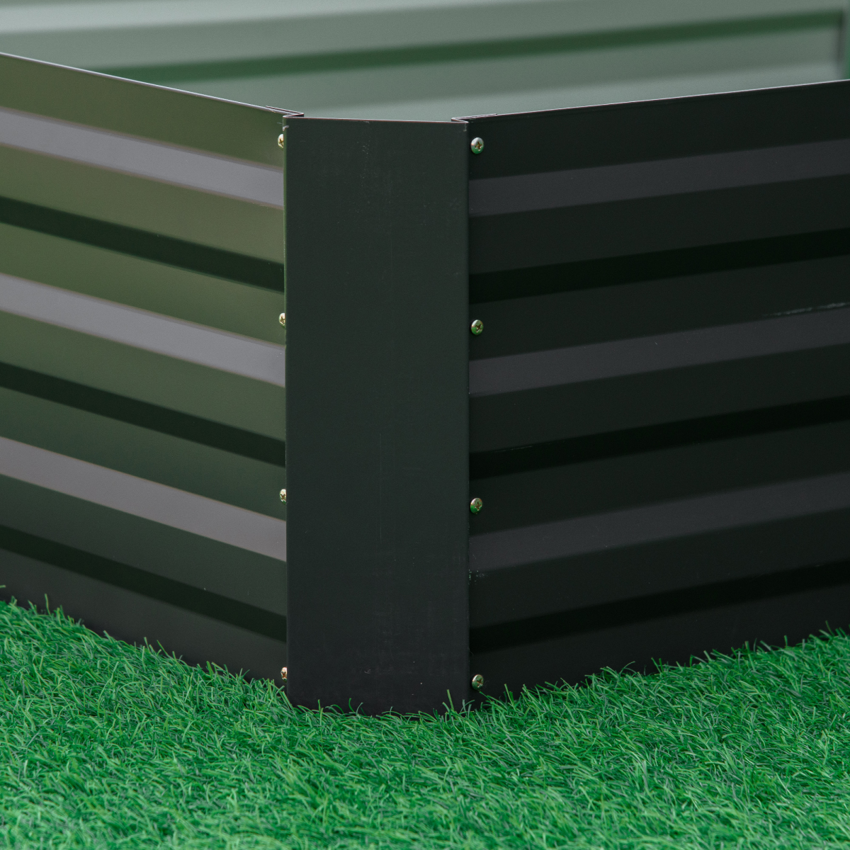 Outsunny 120x80cm galvanized steel raised garden bed corner on artificial grass.