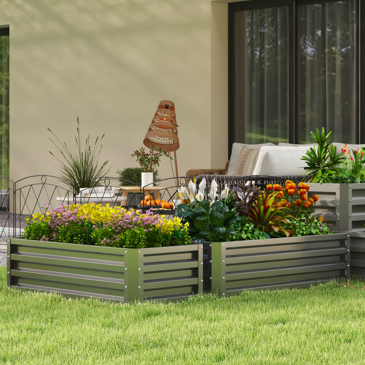 Outsunny galvanised steel planter boxes two-pack on a patio, filled with colorful flowers beside a seating area.