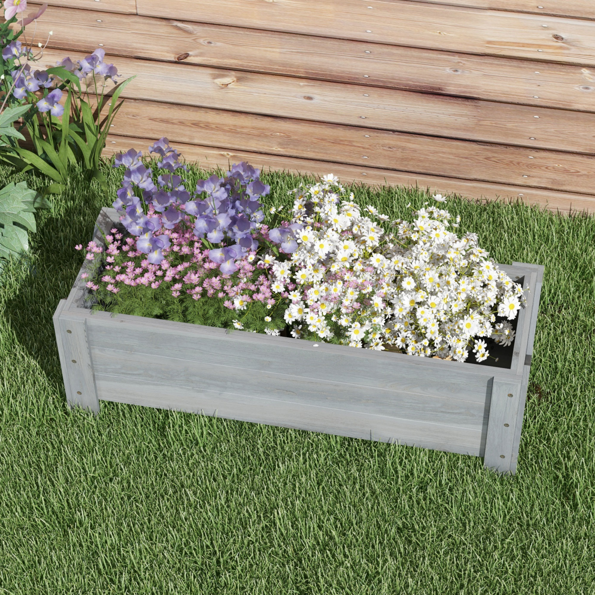 Outsunny Raised Bed Planter 100x36.5x36cm drainage garden, filled with mixed flowers in a wooden planter on grass.