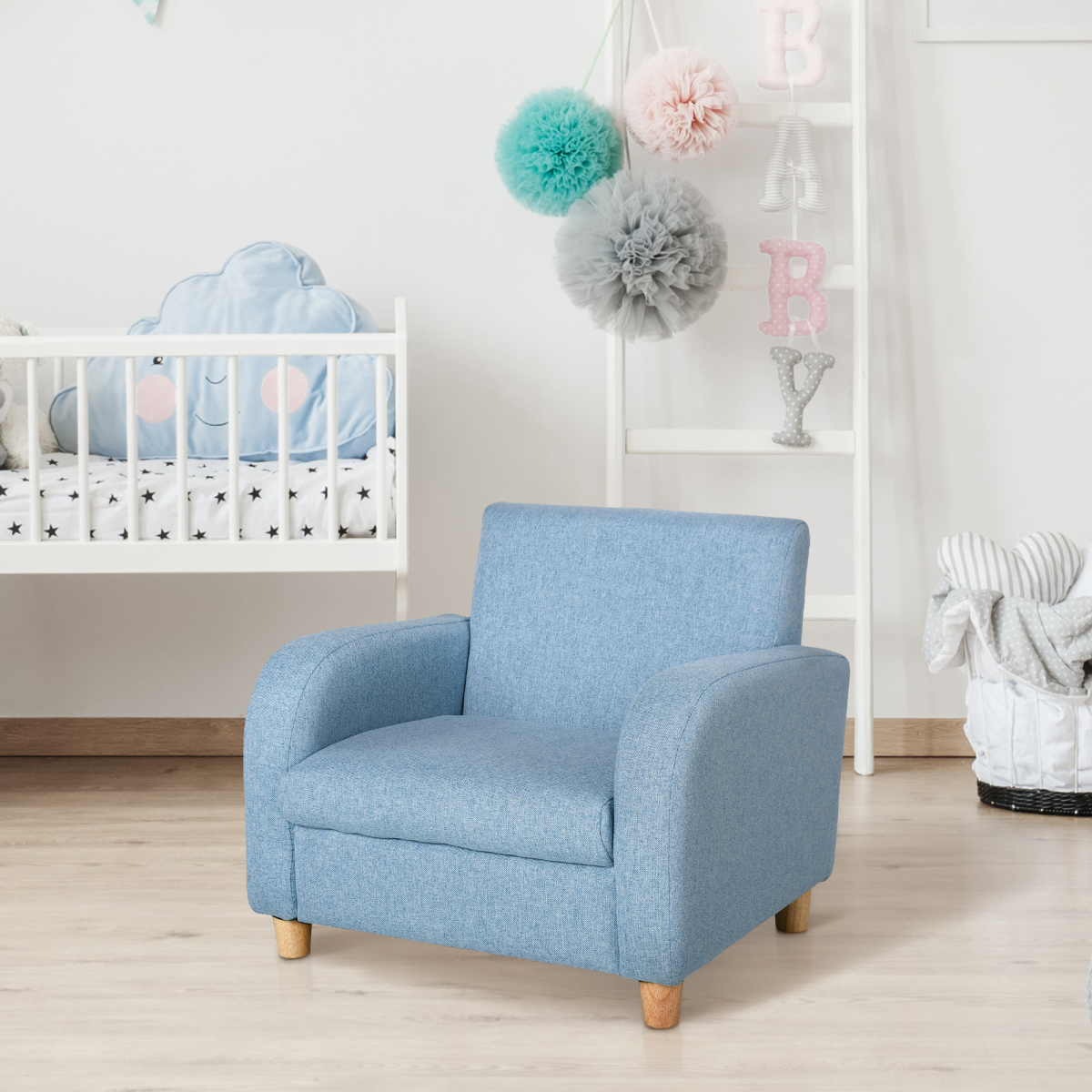 Blue cushioned kids armchair with a wooden frame and short natural legs in a nursery.
