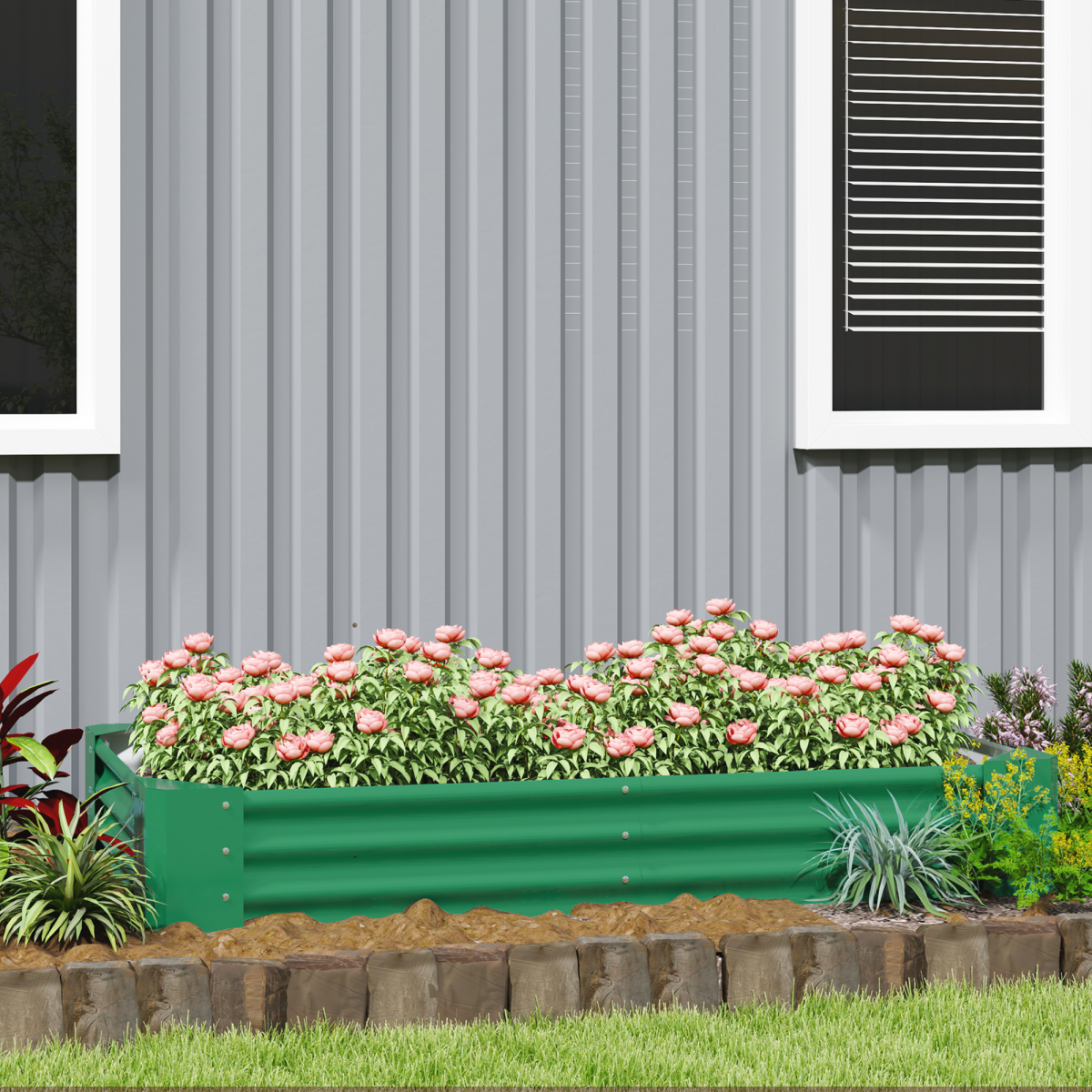 Green galvanized steel raised bed 180x90x30 cm filled with pink flowers beside a gray house.