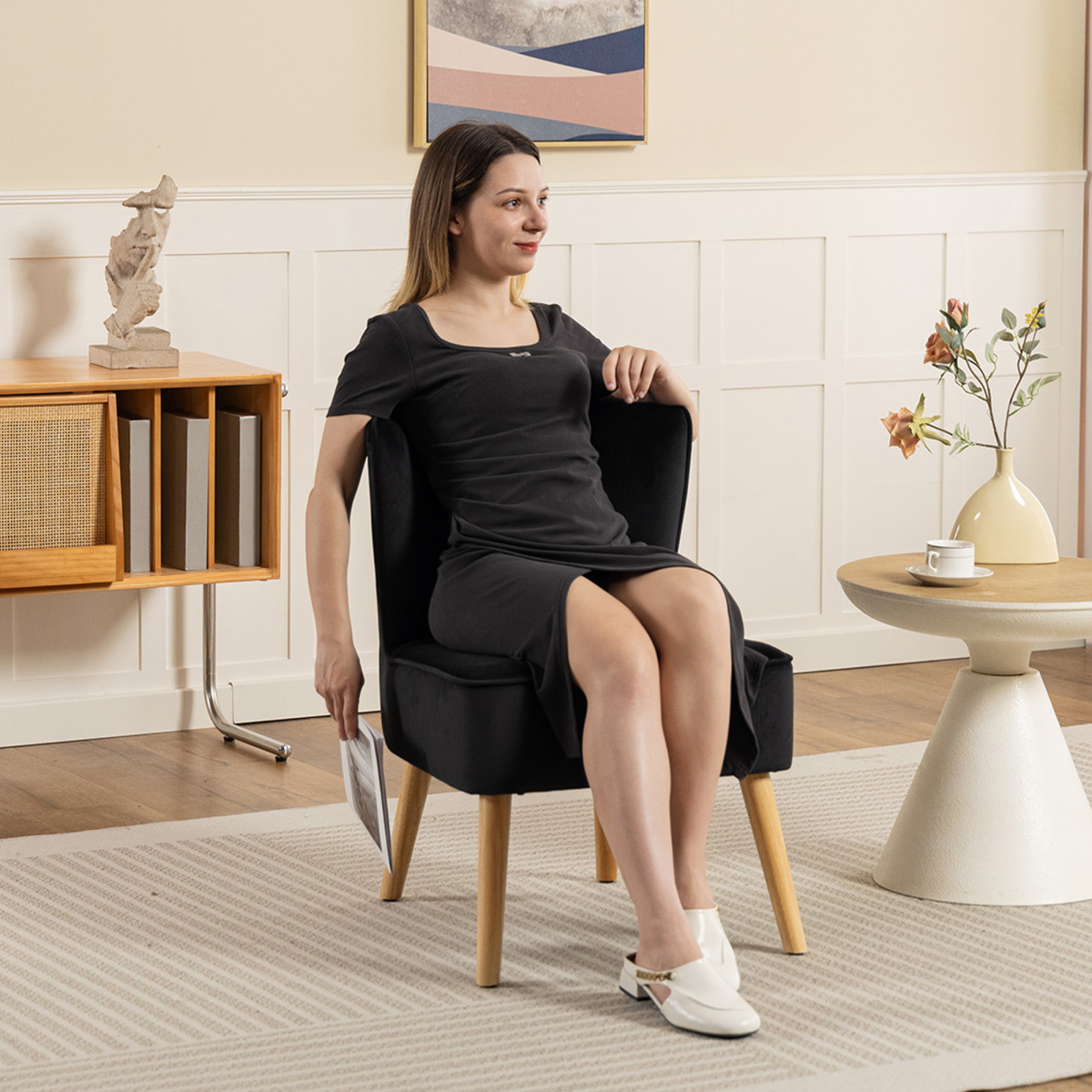 HOMCOM Velvet Tub Chair Compact Padding For Living Room: sleek armless chair with velvet upholstery and wooden legs in a modern living room.