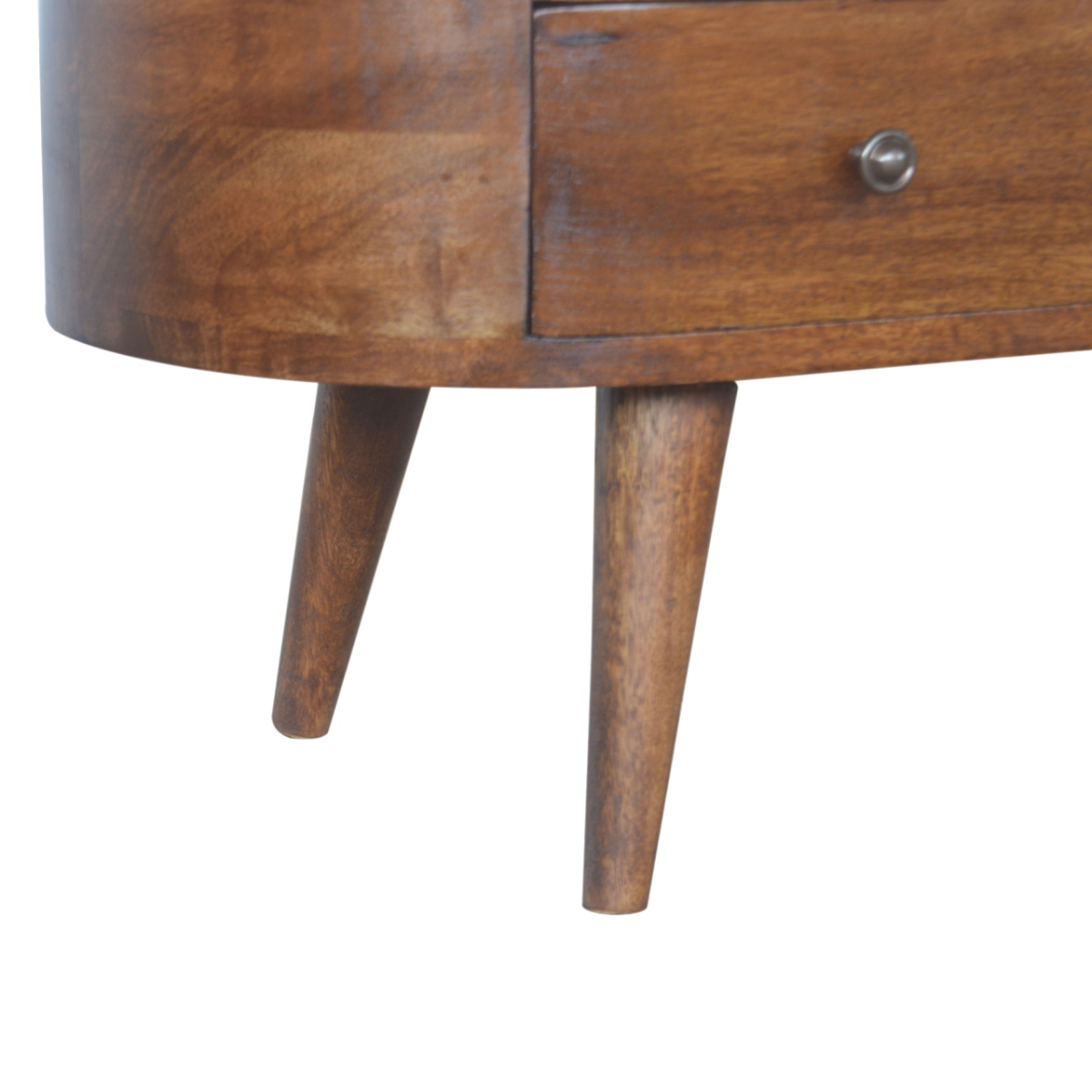 Artisan entertainment unit in solid mango wood with chestnut finish, rounded edges, drawer with knob, and tapered legs.