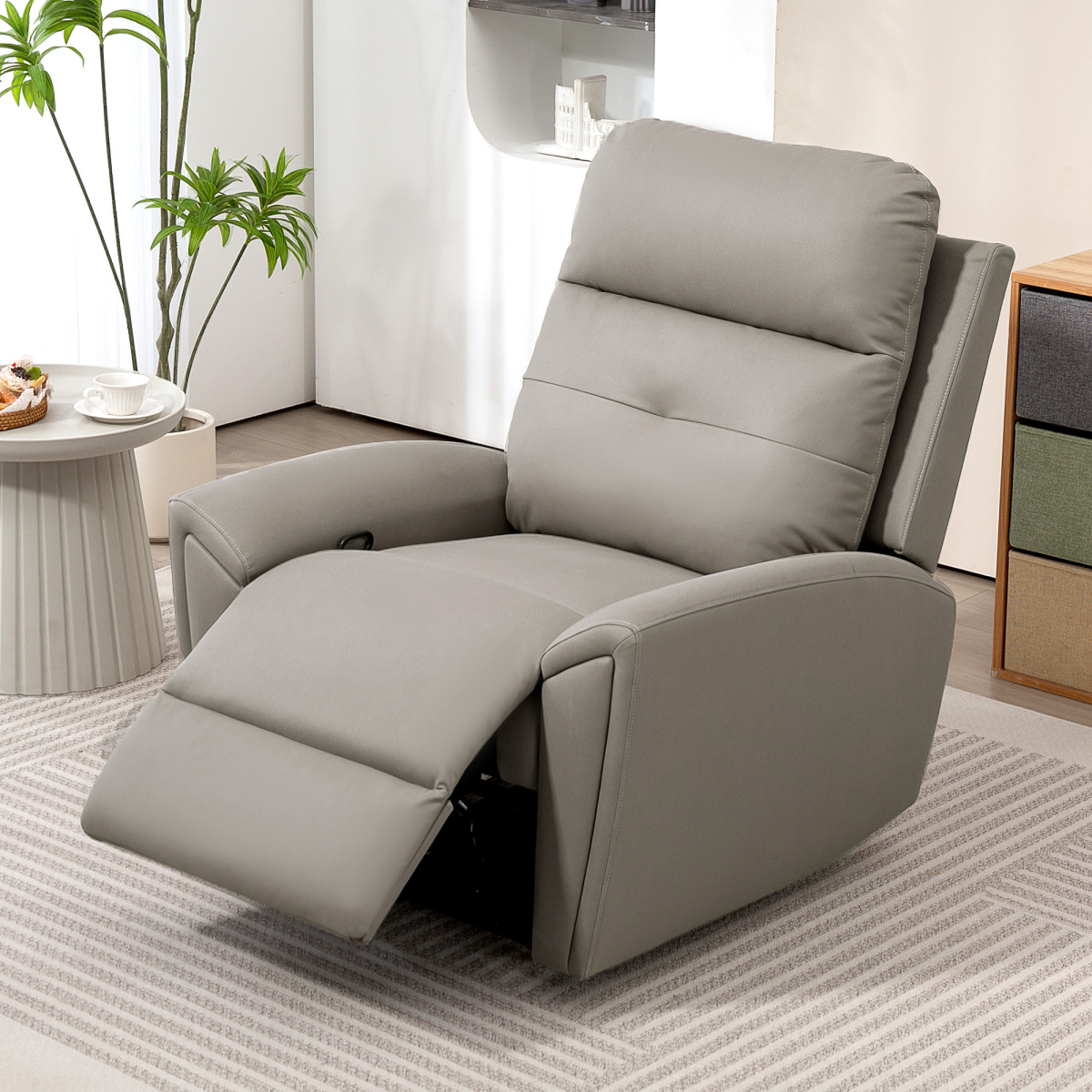 HOMCOM Full Size Manual Recliner Armchair For Living Room in gray with extended footrest in a modern living room.