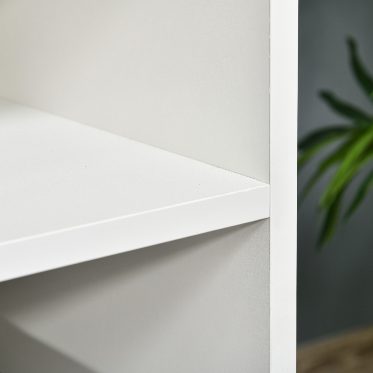 Close-up of white HOMCOM 120cm TV stand edge, modern design with shelf surface and open storage.