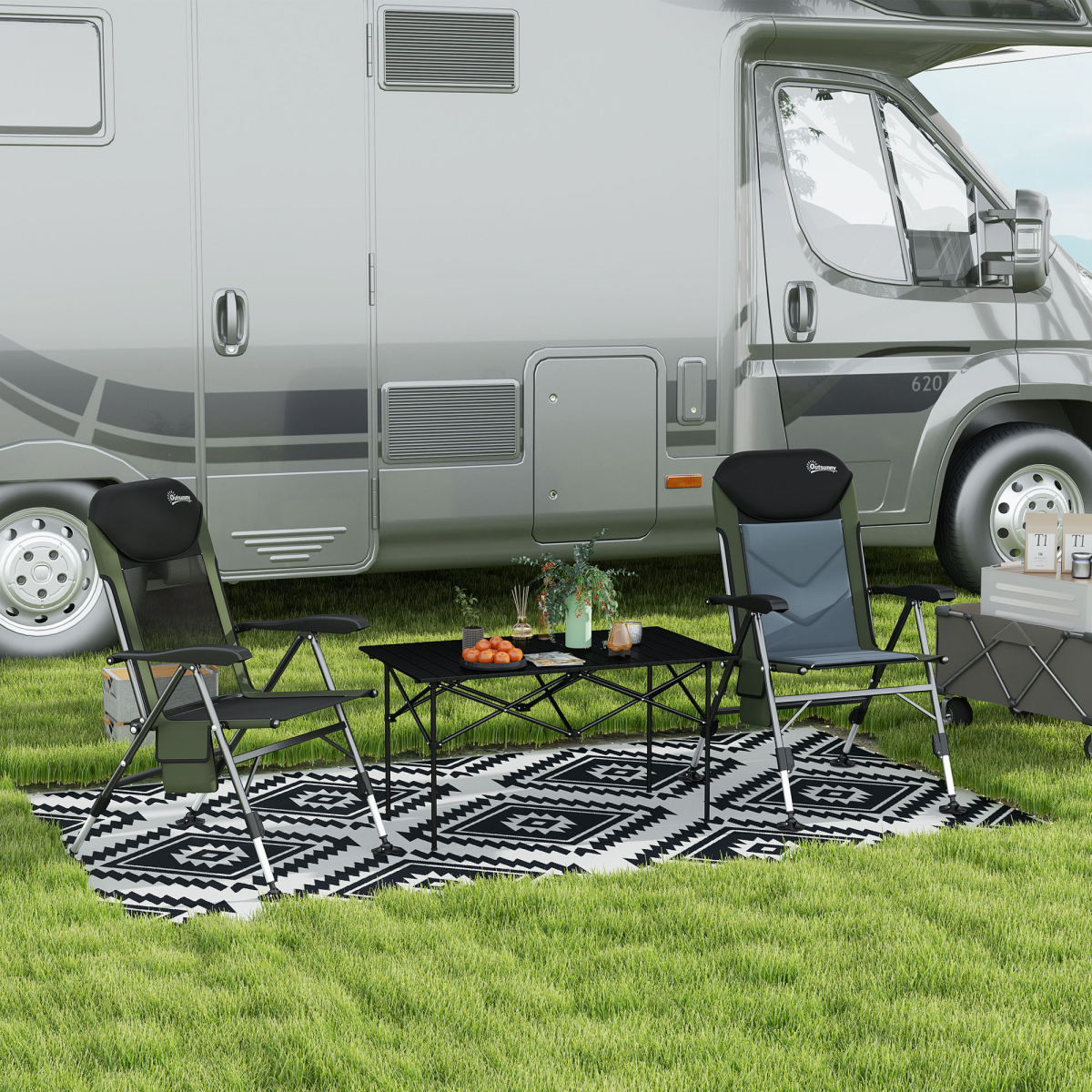 Outsunny 182x274cm Waterproof Outdoor Rug with USB-powered LED lights on a patio beside an RV, with chairs and table.