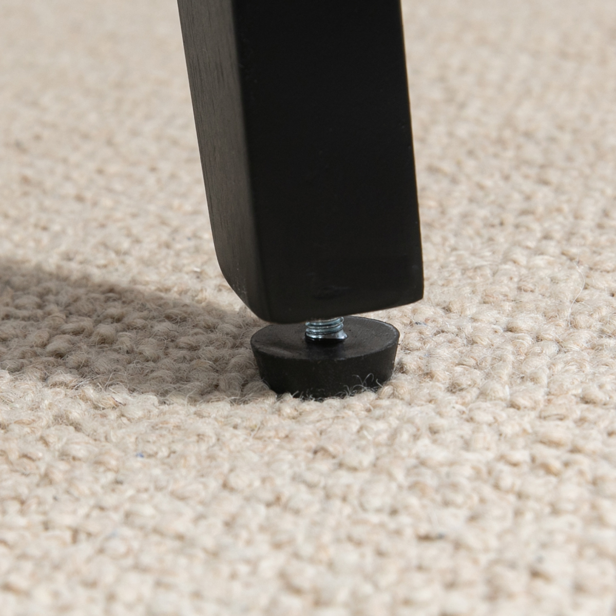 HOMCOM Accent Chair PU Leather Tufted Grey for Living Room — close-up of chair leg with pad on carpet.