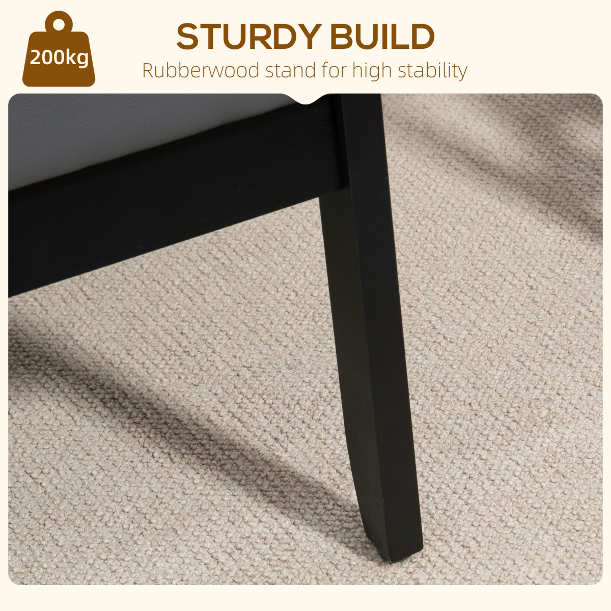 HOMCOM Accent Chair PU Leather Tufted Grey for Living Room - close-up of a black leg on beige carpet.