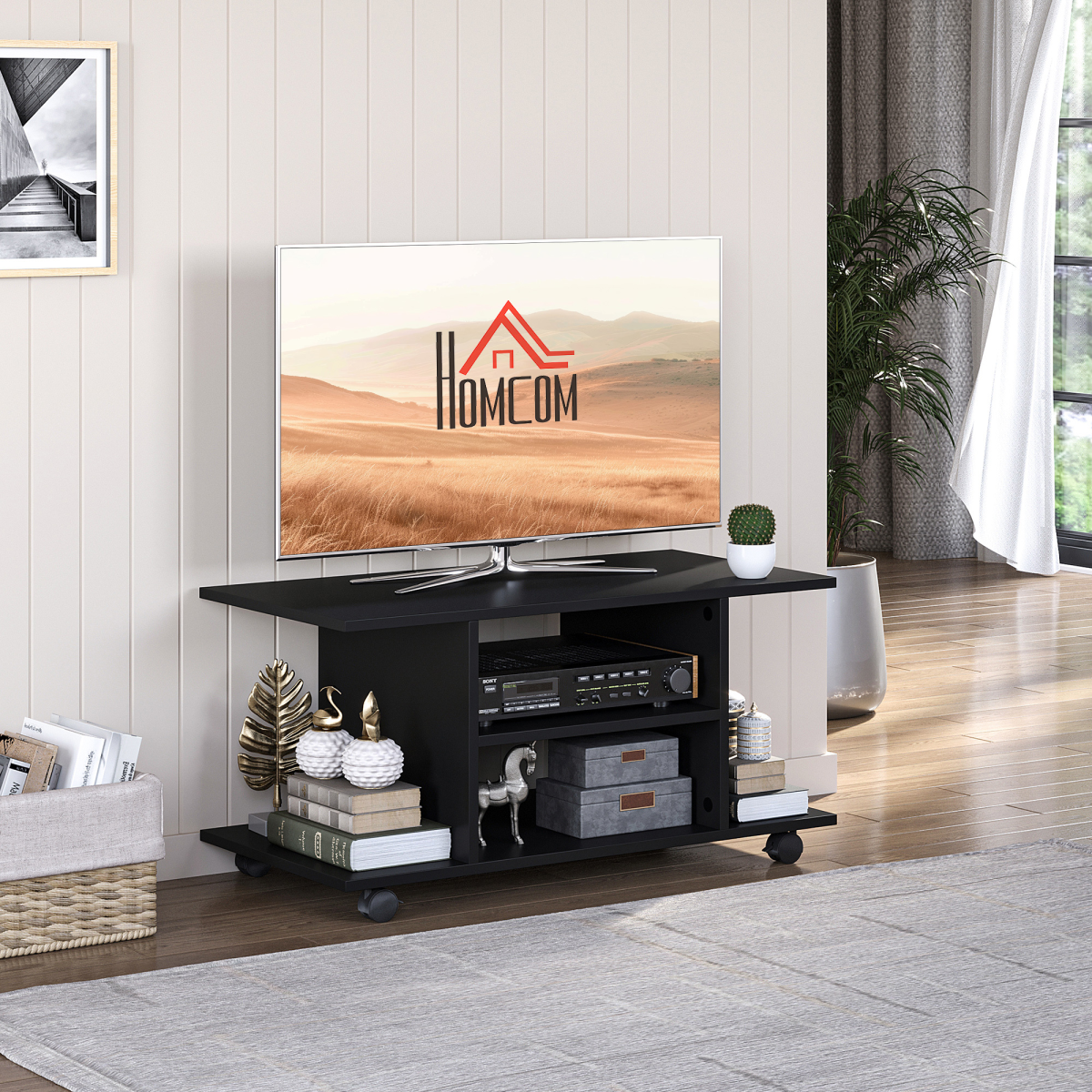 HOMCOM 3-tier TV cabinet stand in black, supports a TV and stores media players and decor in a living room.