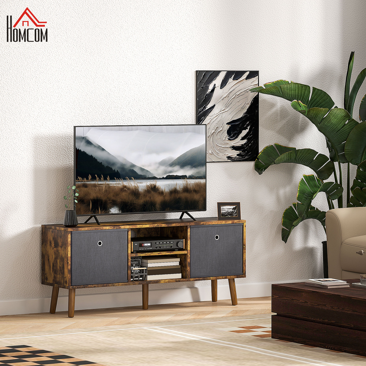 HOMCOM TV cabinet with removable fabric drawers in warm wood finish, TV on top, living room setup.