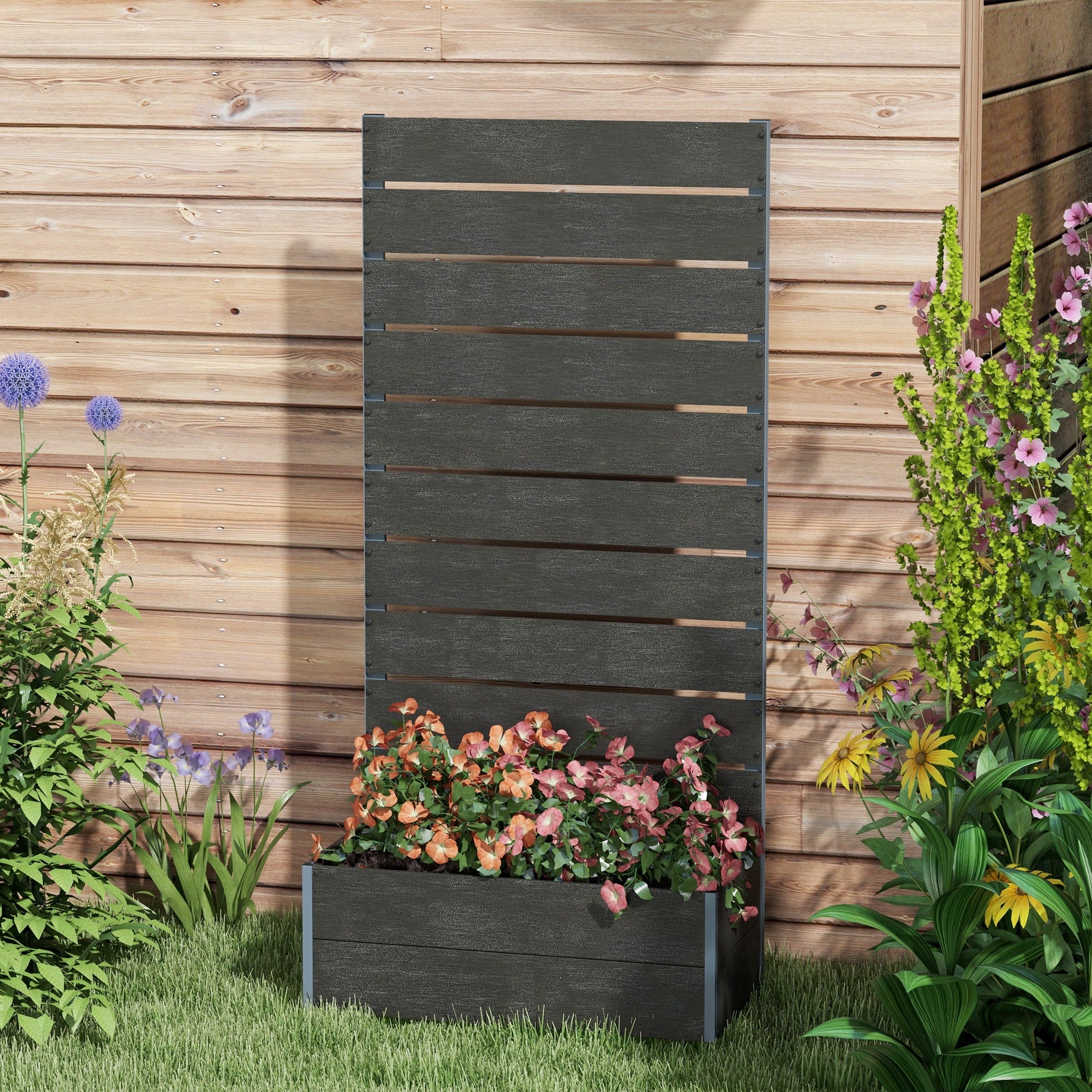Outsunny black raised garden bed with back trellis, elevated planter filled with flowers beside a wooden fence.
