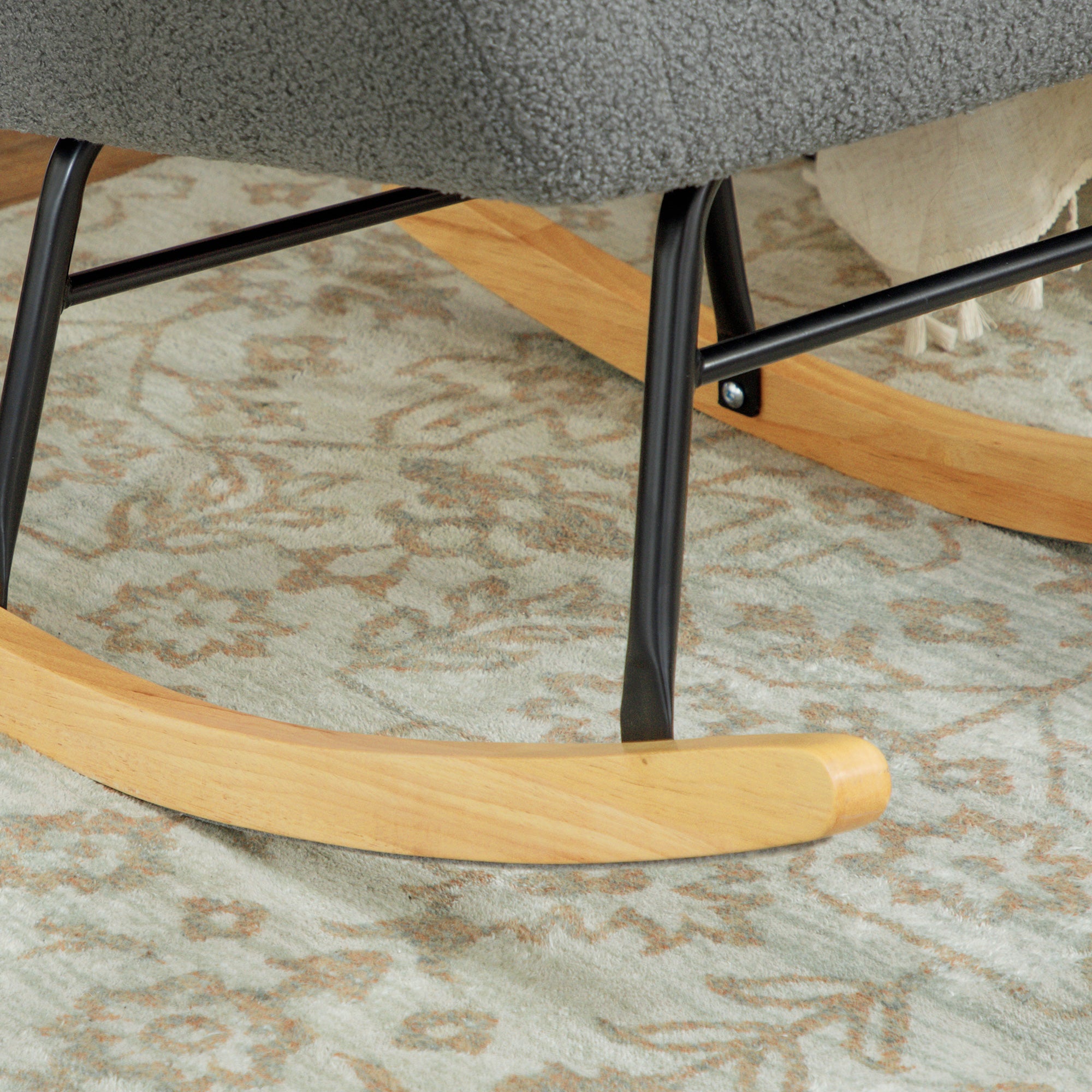 HOMCOM rocking chair with teddy fleece grey upholstery, curved wooden rockers and black metal frame.