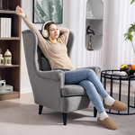 HOMCOM Wingback Chair 70cm High Velvet Comfort Living Room — woman relaxing in a grey velvet chair.