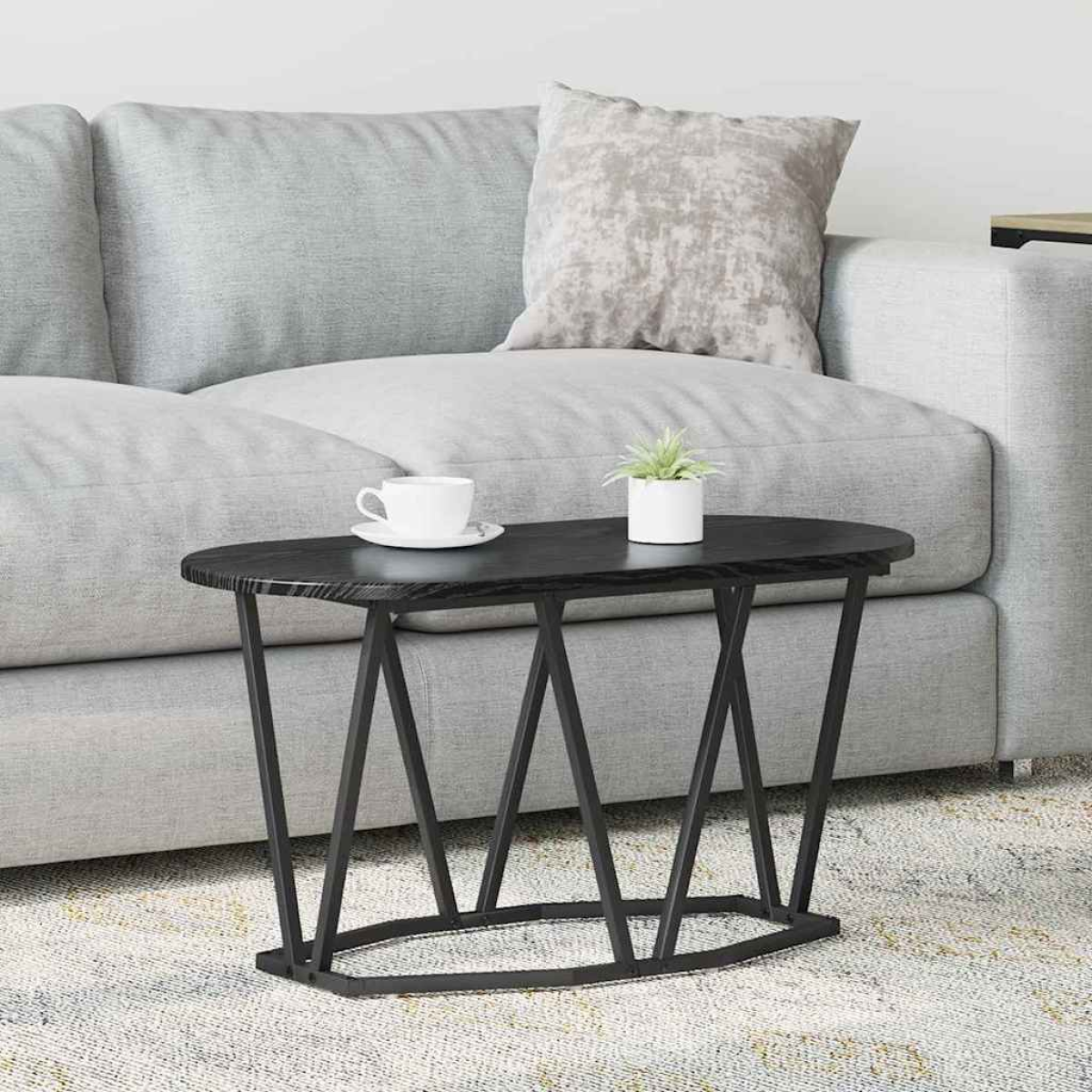 VidaXL Coffee Table 80 x 40 x 40.5 cm Oval Design with warm wood top and black metal legs in a living room.
