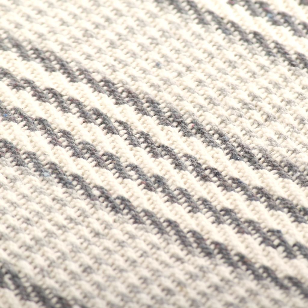 Soft cotton texture of vidaXL Throw Cotton Herringbone 125x150 cm Grey, perfect for cozying up your space.