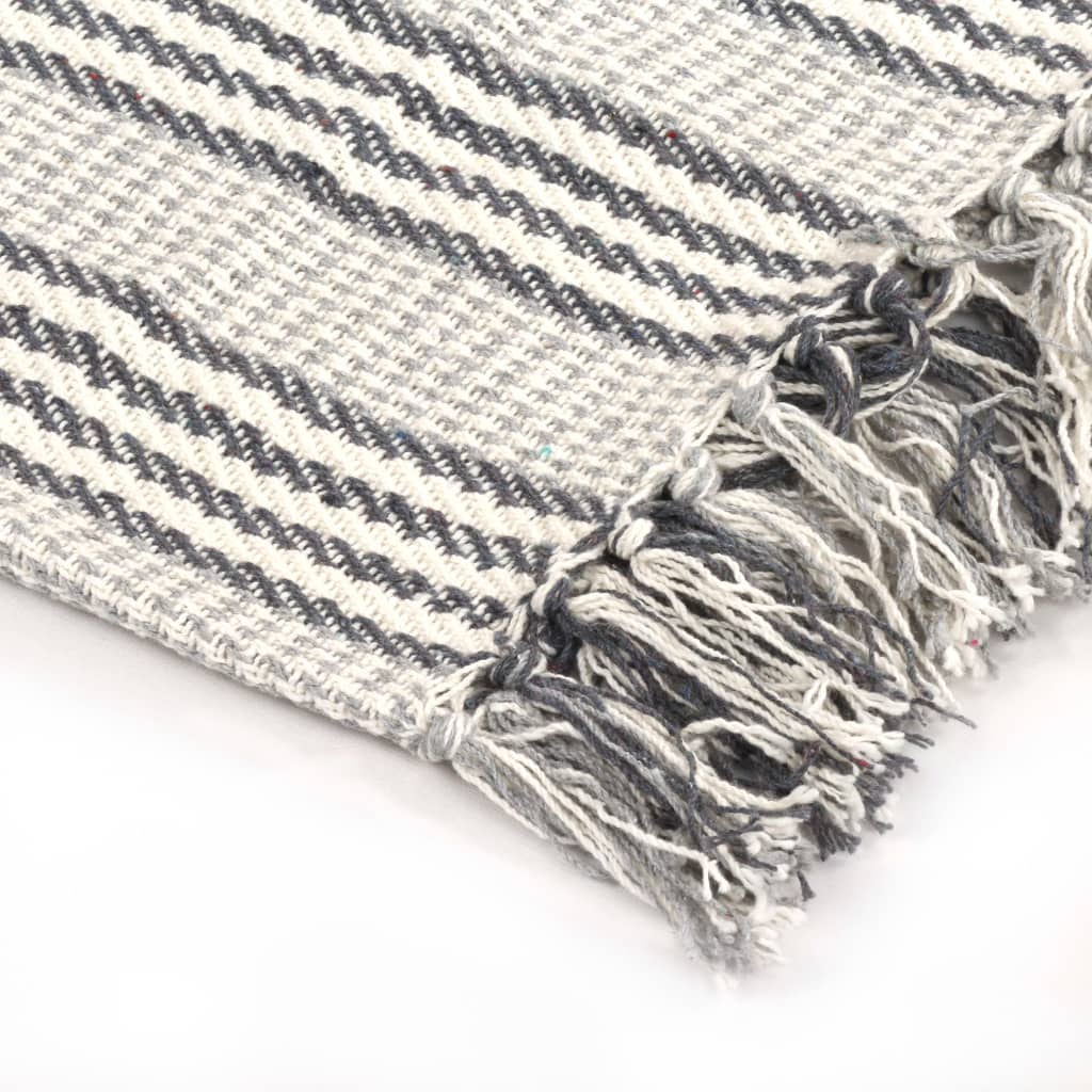 Soft cotton vidaXL Throw Cotton Herringbone 125x150 cm Grey with trendy tassels, perfect for cozying up any space.