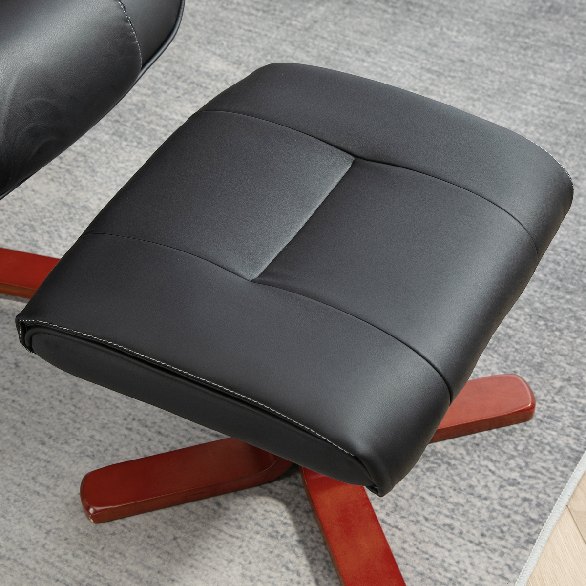 HOMCOM Reclining Armchair With Footstool For Living Room in black leather with wooden base.