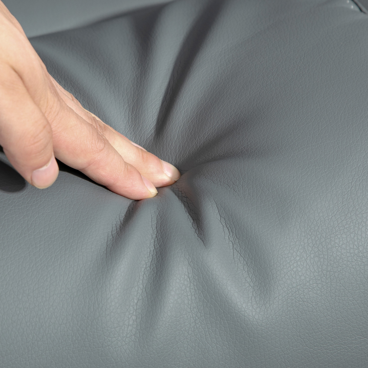 HOMCOM Reclining Armchair With Footstool For Living Room fabric texture close-up in gray upholstery