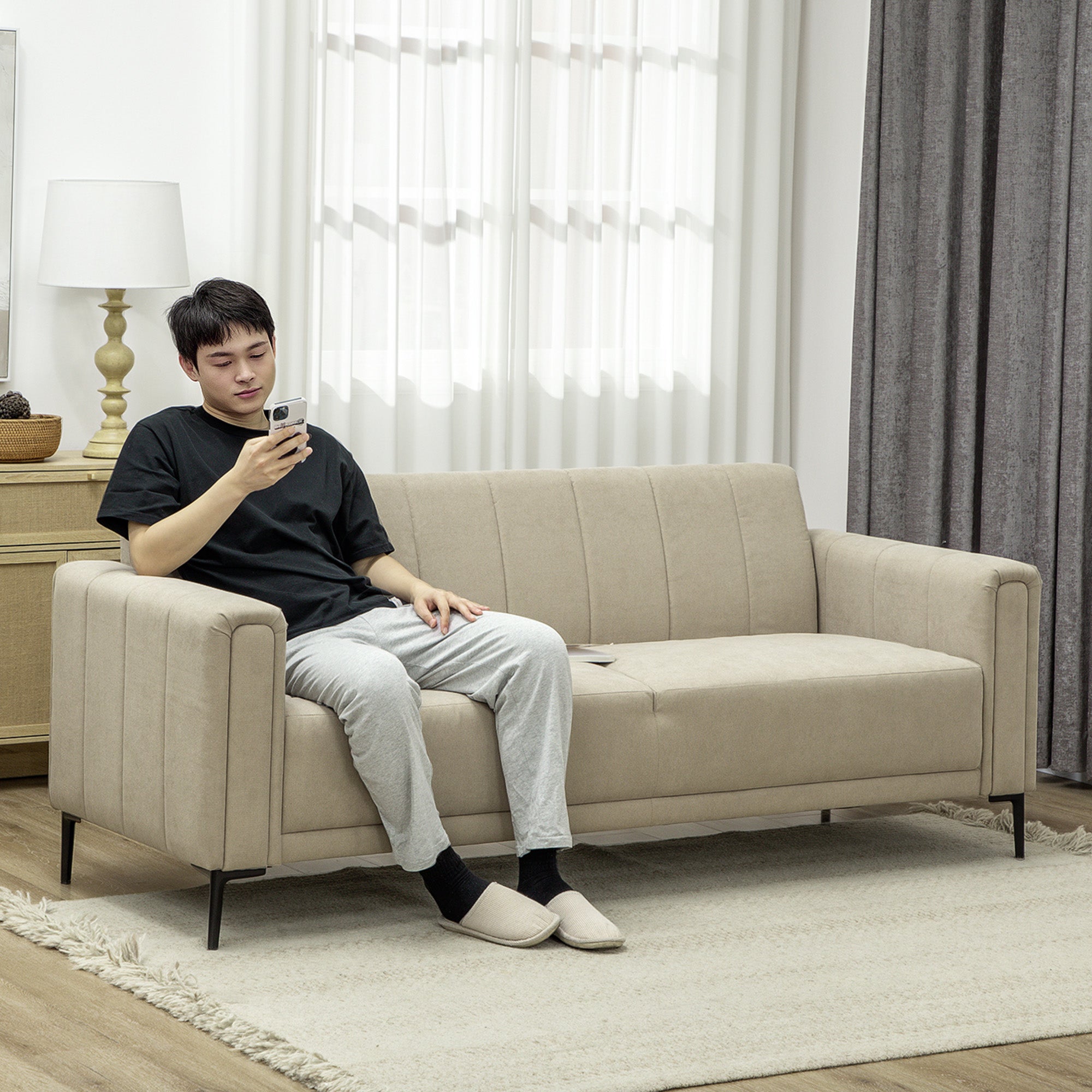 HOMCOM Three Seater Sofa Full Size Channel Tufted For Home in a beige fabric, modern living room setting with a person.