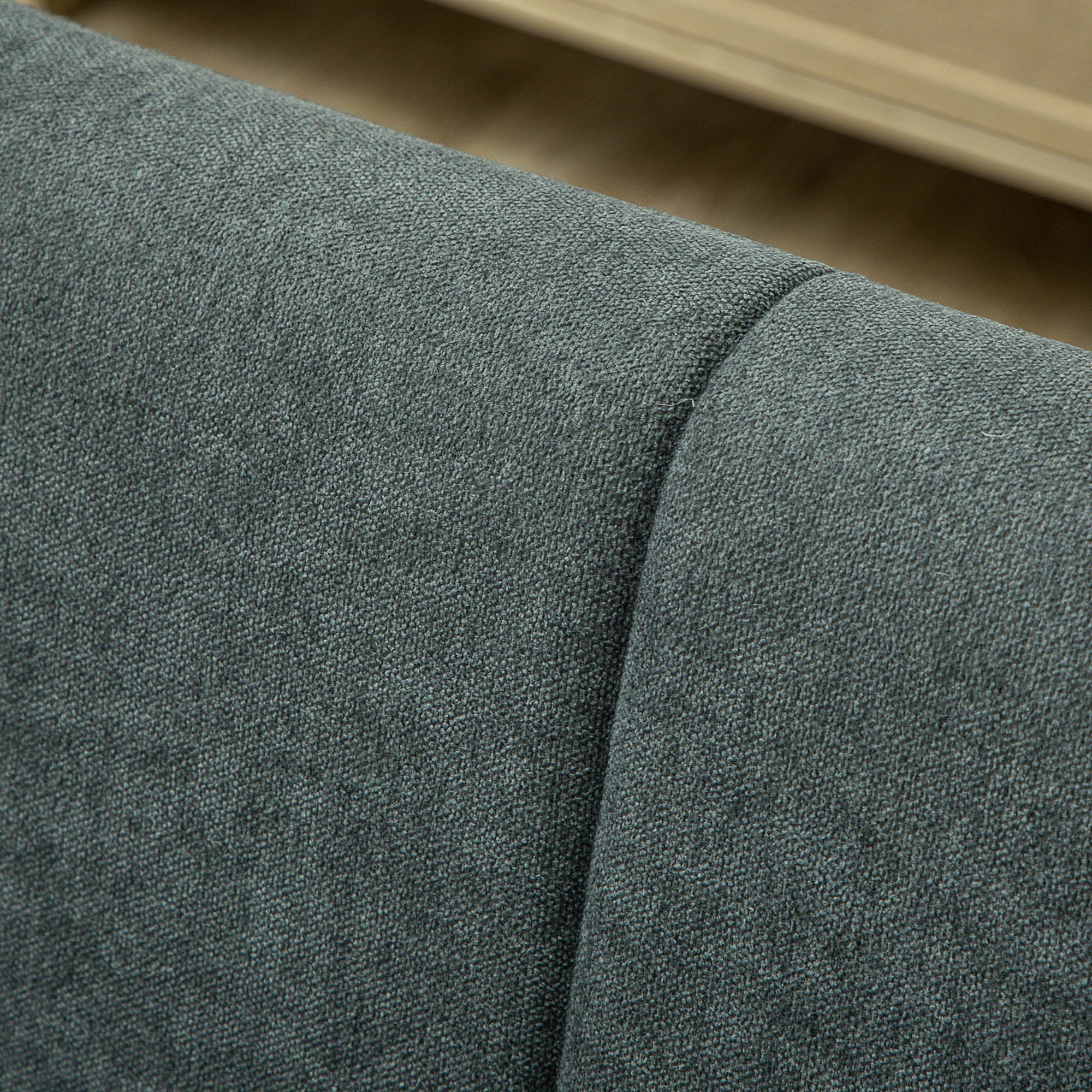 Close-up of HOMCOM Three Seater Sofa Full Size Channel Tufted For Home fabric with textured linen-look upholstery.