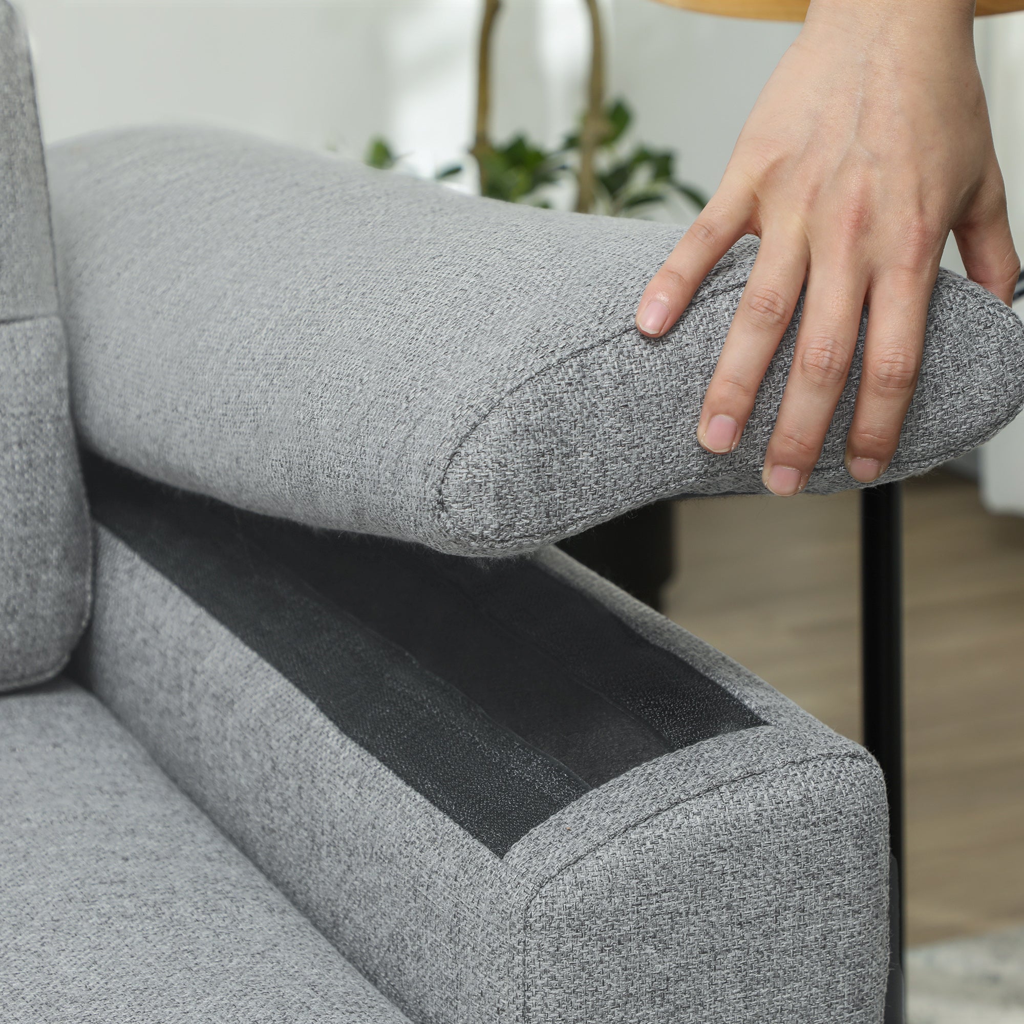 Homcom Sofa Bed Two Seater Click Clack For Living Room closeup of dark grey fabric armrest and seat.