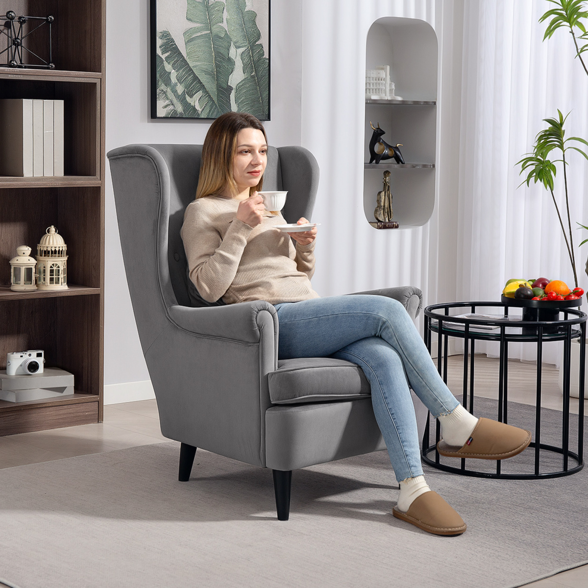 HOMCOM Wingback Chair 70cm High Velvet Comfort Living Room in gray velvet, a person relaxing at home.
