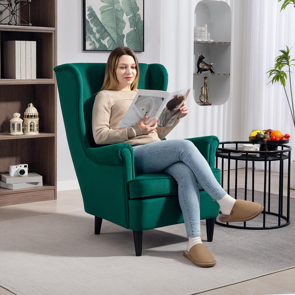 HOMCOM Wingback Chair 70cm High Velvet Comfort Living Room in green velvet, a woman sits reading a magazine.