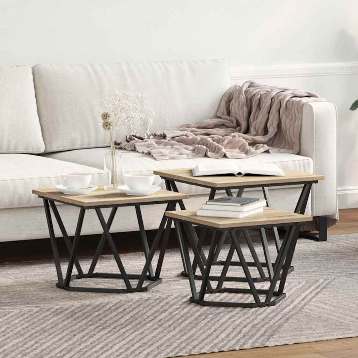 VidaXL Coffee Tables 50 x 50 x 40 cm Black Oak Set of 3: three oak-top tables with black metal bases in a living room.