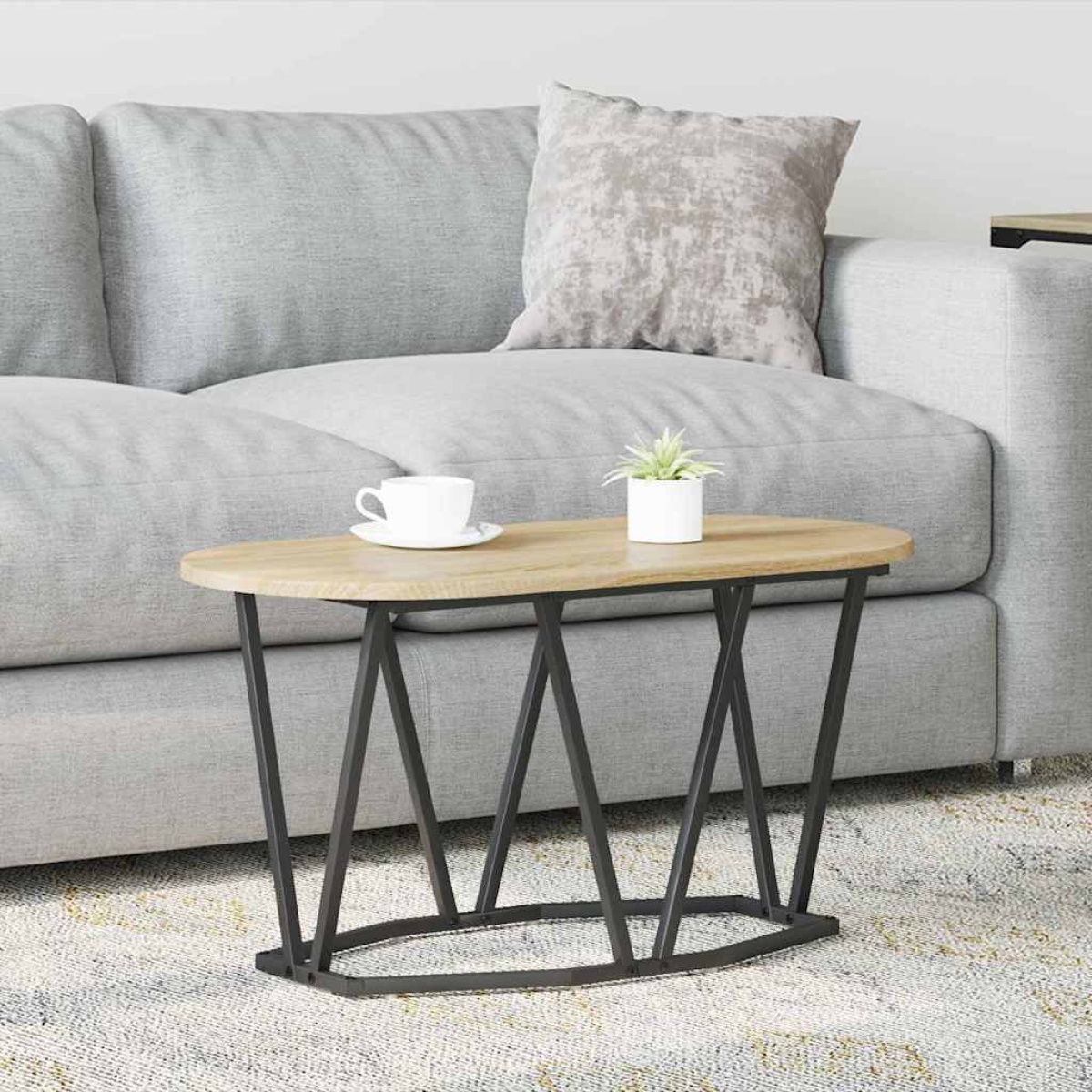VidaXL Coffee Table 80 x 40 x 40.5 cm Oval Design with warm wood top and black metal legs in a modern living room.