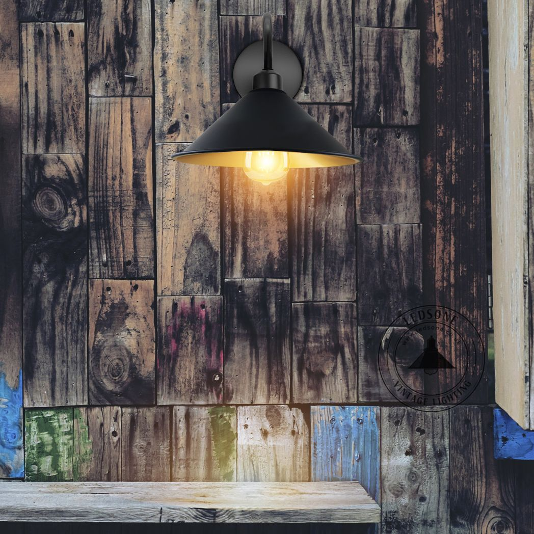 Home Symphony Black Wall Light Medium Cone Shade E27 Swan Neck Home on rustic wood wall.