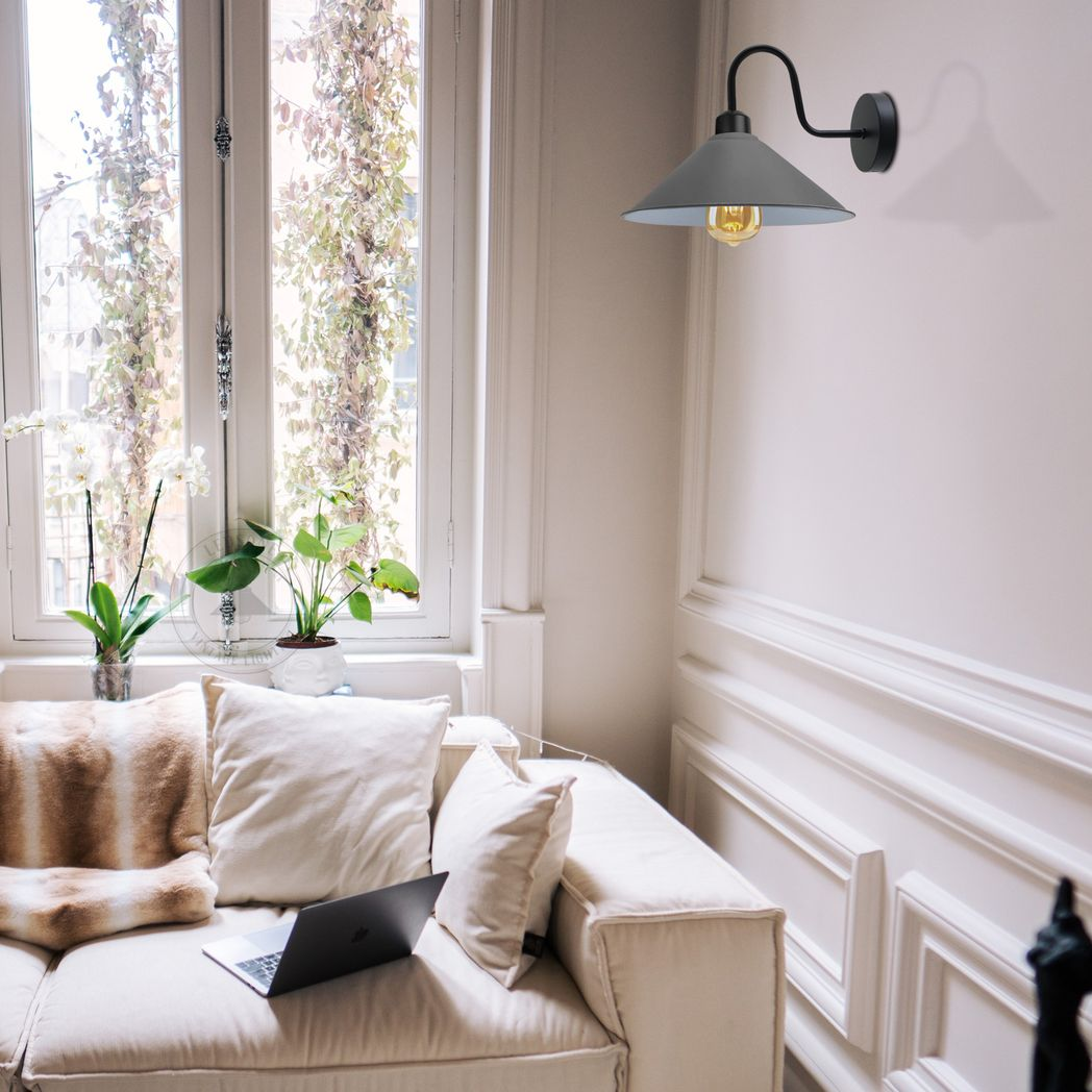 Home Symphony Premium Grey Wall Lamp Cone Shade Swan Neck For E27 Socket casts warm downward light in a living room.