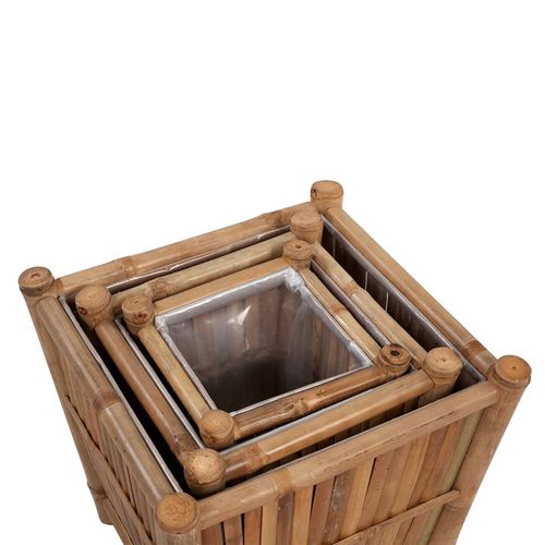 Stylish 3 pcs Bamboo Raised Bed with Nylon Lining, perfect for enhancing your garden or patio with vibrant plants.