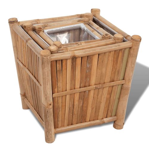 Elevate your garden with the 3 pcs Bamboo Raised Bed with Nylon Lining, perfect for nurturing your plants outdoors.